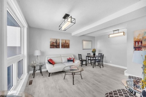 116-6440 4 Street Nw, Calgary, AB - Indoor Photo Showing Living Room
