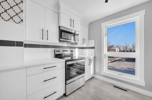 116-6440 4 Street Nw, Calgary, AB - Indoor Photo Showing Kitchen