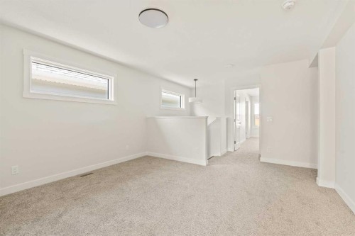 82 Royston Park Nw, Calgary, AB - Indoor Photo Showing Other Room