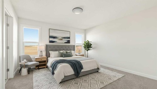 82 Royston Park Nw, Calgary, AB - Indoor Photo Showing Bedroom