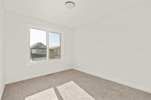 82 Royston Park Nw, Calgary, AB - Indoor Photo Showing Other Room