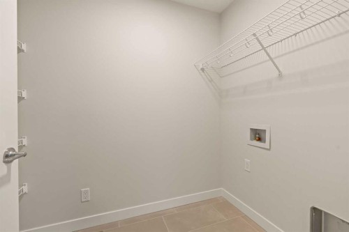 82 Royston Park Nw, Calgary, AB - Indoor With Storage