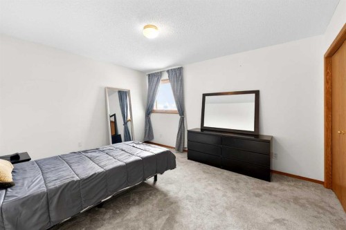 36 Edgevalley Place Nw, Calgary, AB - Indoor Photo Showing Bedroom