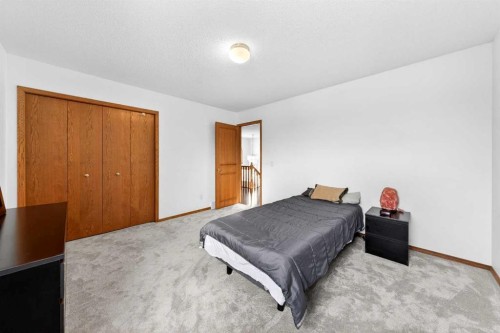 36 Edgevalley Place Nw, Calgary, AB - Indoor Photo Showing Bedroom