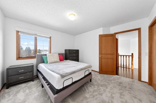 36 Edgevalley Place Nw, Calgary, AB - Indoor Photo Showing Bedroom