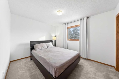 36 Edgevalley Place Nw, Calgary, AB - Indoor Photo Showing Bedroom