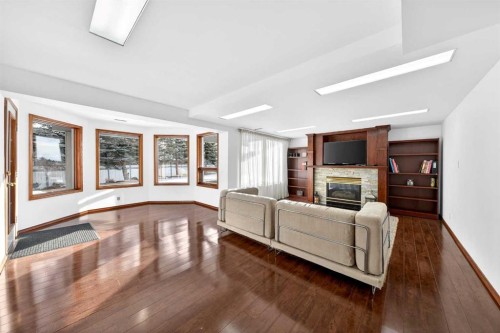 36 Edgevalley Place Nw, Calgary, AB - Indoor With Fireplace