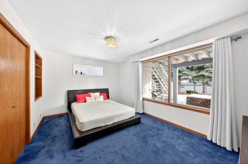 36 Edgevalley Place Nw, Calgary, AB - Indoor Photo Showing Bedroom