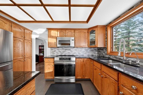 36 Edgevalley Place Nw, Calgary, AB - Indoor Photo Showing Kitchen With Double Sink