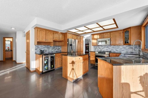 36 Edgevalley Place Nw, Calgary, AB - Indoor Photo Showing Kitchen With Double Sink