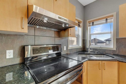 71 Kincora Park Nw, Calgary, AB - Indoor Photo Showing Kitchen With Double Sink