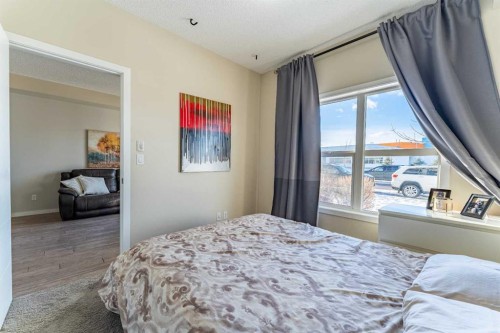 118-402 Marquis Lane Se, Calgary, AB - Indoor Photo Showing Bedroom
