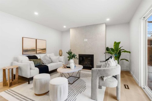 1012 70 Avenue Sw, Calgary, AB - Indoor Photo Showing Living Room With Fireplace