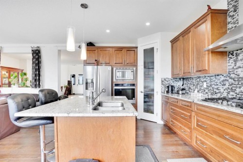 680 Marina Drive, Chestermere, AB - Indoor Photo Showing Kitchen With Double Sink With Upgraded Kitchen