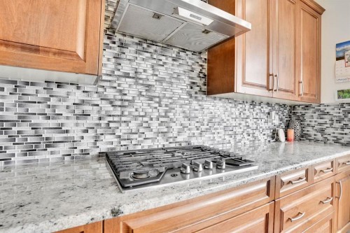 680 Marina Drive, Chestermere, AB - Indoor Photo Showing Kitchen With Upgraded Kitchen