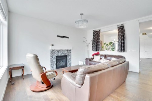 680 Marina Drive, Chestermere, AB - Indoor Photo Showing Living Room With Fireplace