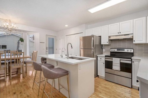 432 56 Avenue Sw, Calgary, AB - Indoor Photo Showing Kitchen With Double Sink