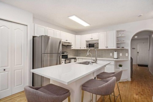 432 56 Avenue Sw, Calgary, AB - Indoor Photo Showing Kitchen With Stainless Steel Kitchen With Double Sink