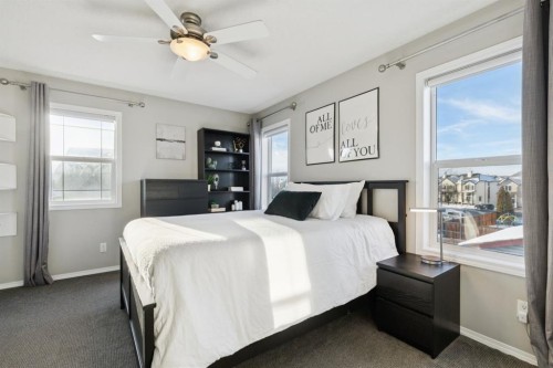 4 Copperfield Rise Se, Calgary, AB - Indoor Photo Showing Bedroom