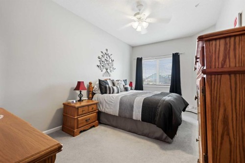 104-43 Westlake Circle, Strathmore, AB - Indoor Photo Showing Bedroom