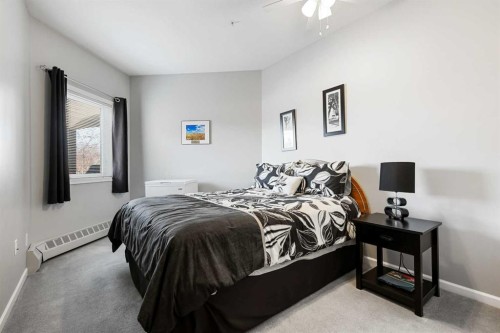104-43 Westlake Circle, Strathmore, AB - Indoor Photo Showing Bedroom