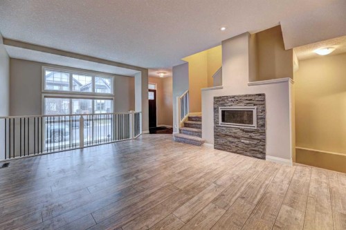 70 Masters Crescent Se, Calgary, AB - Indoor With Fireplace