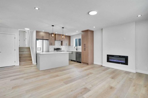 139 Castleglen Way Ne, Calgary, AB - Indoor With Fireplace