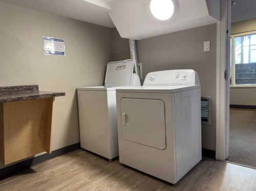 106-6108 53 Street, Olds, AB - Indoor Photo Showing Laundry Room