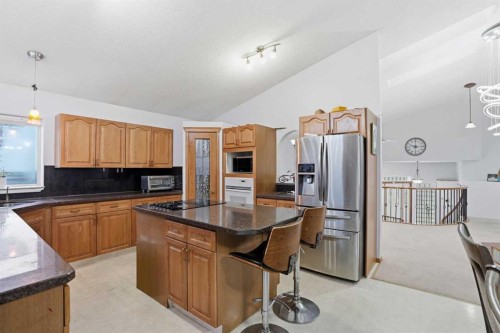 99 Arbour Lake Way Nw, Calgary, AB - Indoor Photo Showing Kitchen With Double Sink