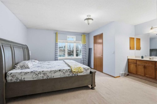 99 Arbour Lake Way Nw, Calgary, AB - Indoor Photo Showing Bedroom