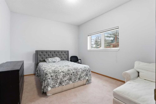 99 Arbour Lake Way Nw, Calgary, AB - Indoor Photo Showing Bedroom