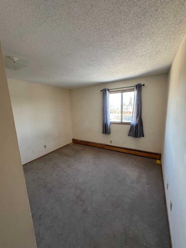 1-7-2515 First Avenue Nw, Calgary, AB - Indoor Photo Showing Other Room