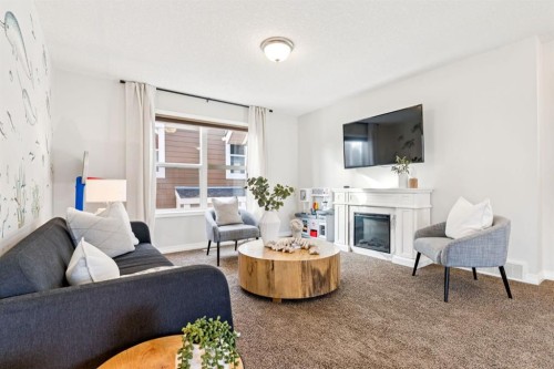 82 Ridge View Place, Cochrane, AB - Indoor Photo Showing Living Room With Fireplace