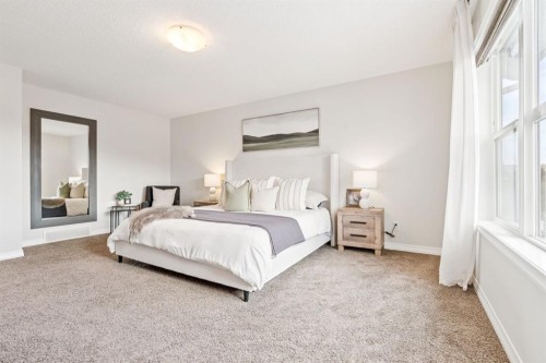 82 Ridge View Place, Cochrane, AB - Indoor Photo Showing Bedroom
