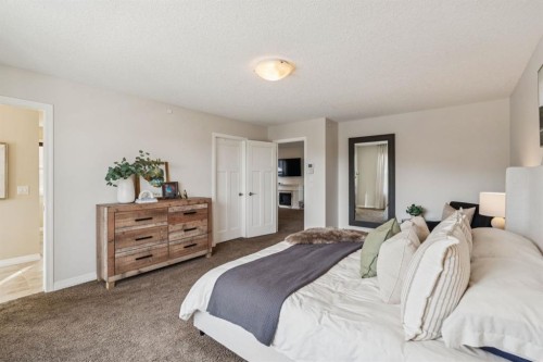 82 Ridge View Place, Cochrane, AB - Indoor Photo Showing Bedroom