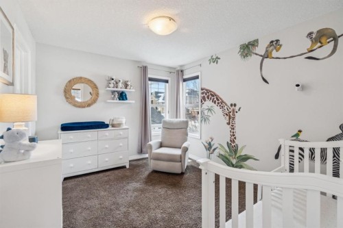 82 Ridge View Place, Cochrane, AB - Indoor Photo Showing Bedroom