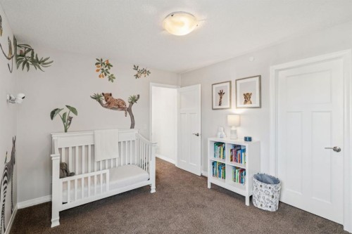 82 Ridge View Place, Cochrane, AB - Indoor Photo Showing Bedroom