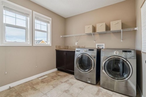 82 Ridge View Place, Cochrane, AB - Indoor Photo Showing Laundry Room