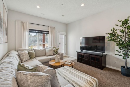 82 Ridge View Place, Cochrane, AB - Indoor Photo Showing Living Room