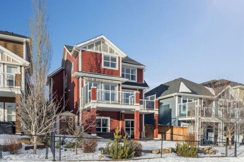 82 Ridge View Place, Cochrane, AB - Outdoor With Deck Patio Veranda With Facade