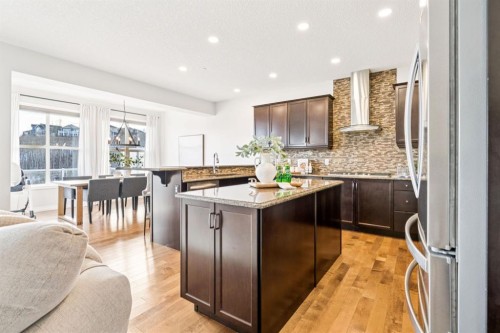 82 Ridge View Place, Cochrane, AB - Indoor Photo Showing Kitchen With Upgraded Kitchen