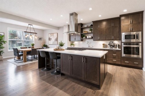 5 Riviera Place, Cochrane, AB - Indoor Photo Showing Kitchen With Upgraded Kitchen