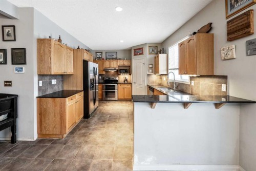 40 Mckinnon Street Nw, Langdon, AB - Indoor Photo Showing Kitchen