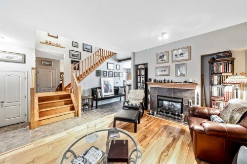40 Mckinnon Street Nw, Langdon, AB - Indoor Photo Showing Living Room With Fireplace