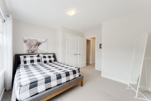 218 Riviera View, Cochrane, AB - Indoor Photo Showing Bedroom