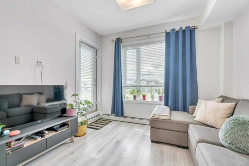 1321-76 Cornerstone Passage Ne, Calgary, AB - Indoor Photo Showing Living Room