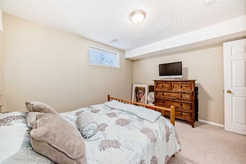 232 Coral Keys Place Ne, Calgary, AB - Indoor Photo Showing Bedroom