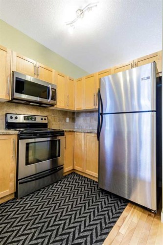 2501-155 Silverado Skies Link Sw, Calgary, AB - Indoor Photo Showing Kitchen