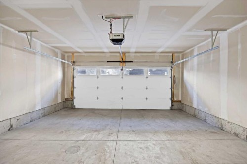 1403-280 Chelsea Road, Chestermere, AB - Indoor Photo Showing Garage