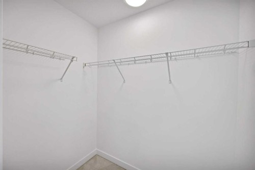 1403-280 Chelsea Road, Chestermere, AB - Indoor With Storage